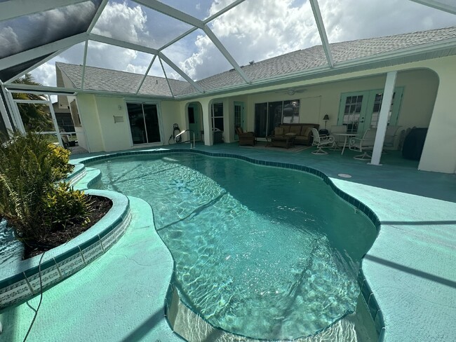 Building Photo - "Charming 3-Bedroom Home with Pool Oasis"