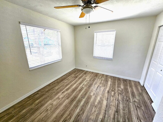 Building Photo - fully renovated 2-bedroom, 1-bathroom home with bonus guest room or office and oversized fenced yard