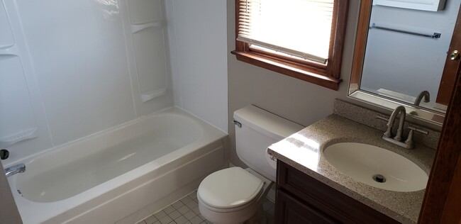 Nice and clean bathroom upstairs - 609 S Main St