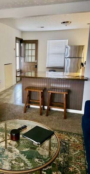 Island with foldout kitchen table - 1214 Glade Hill Dr