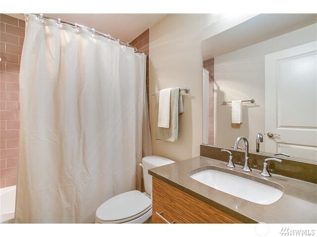 Bathrrom offers slab countertops - 15140 NE 82nd St