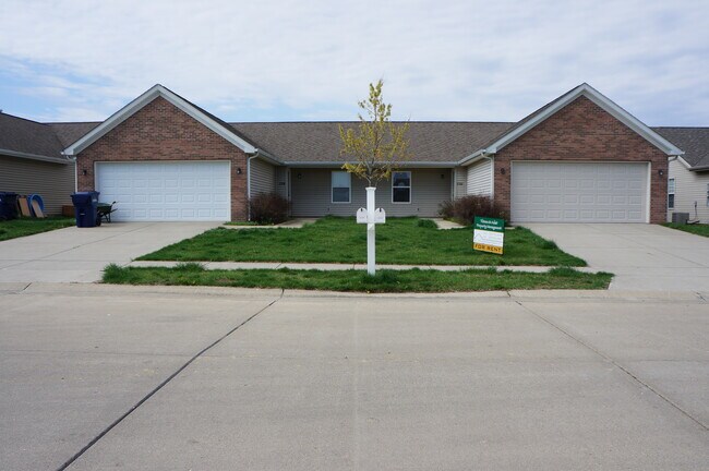 Building Photo - Wake up to a stunning pond view in this beautiful 2 BD 2BA duplex with a 2 car attached garage