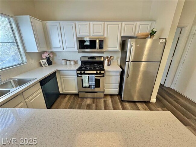 Building Photo - Well-maintained condo located in a convenient Southwest Las Vegas community. Attached 2 car garage.