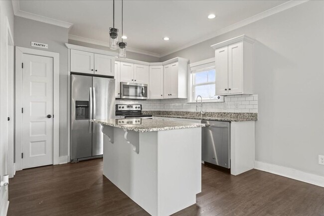 Building Photo - Your New Home! 3 Beds, 2.5 Baths, Hardwood Throughout, Fenced Back Yard, 3 Patios, + Community Pool!