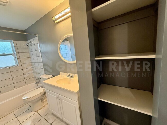 Building Photo - Fully Renovated 2BR Brick Home with Vaulted Ceilings & Backyard Retreat!
