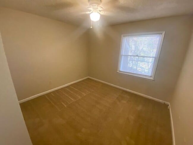 Building Photo - NOW AVAILABLE! Charming 2-Bedroom, 2-Bathroom Single-Level Townhome