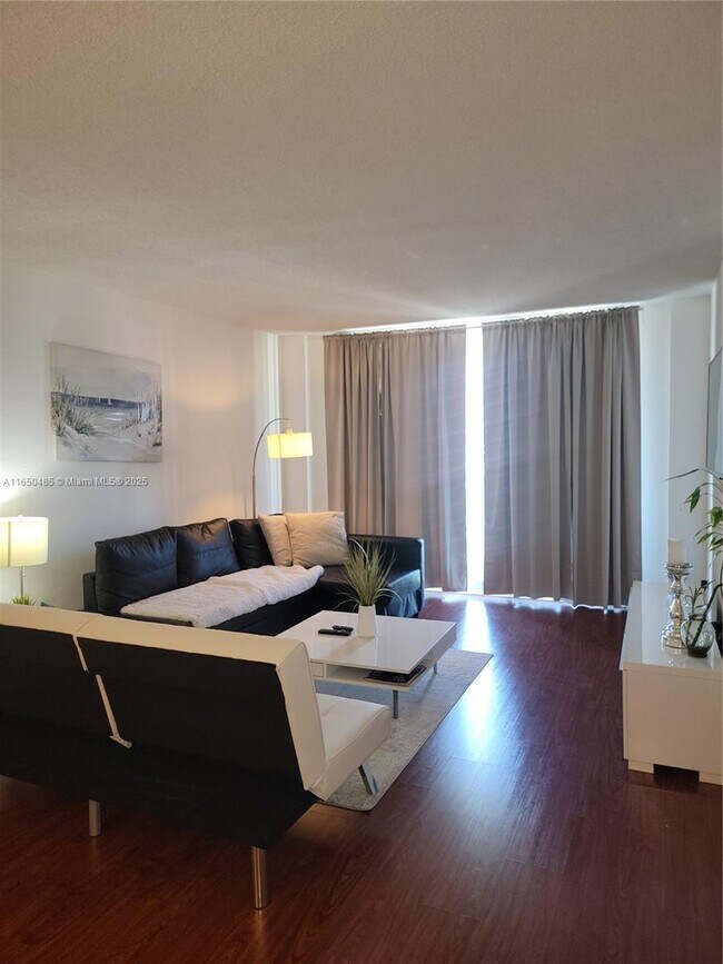 Building Photo - 19380 Collins Ave