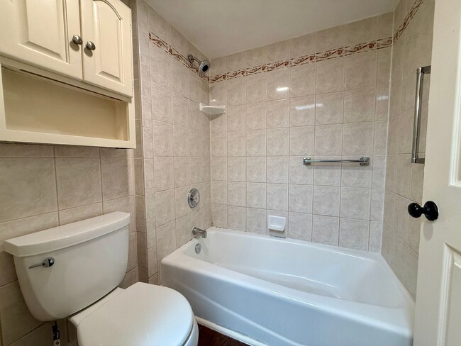 Building Photo - Spacious & Stylish Mission Plymor Townhome! 2 Assigned Parking! AC!