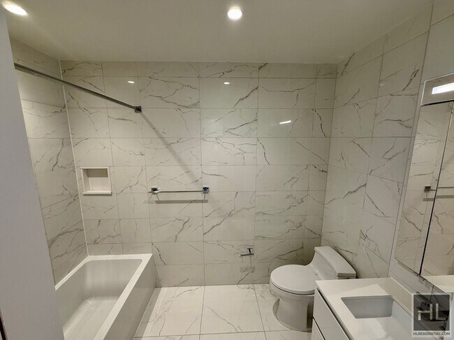 Building Photo - SUNNY NO FEE STUDIO IN THE LUXURY SUMMIT NYC