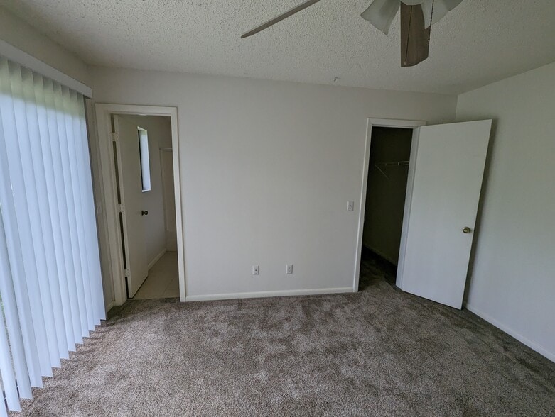 Master bedroom-doors to bathroom and closet - 3740 Giblin Dr