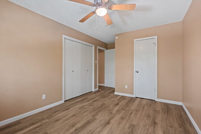 Building Photo - Furnished Option, Modern Comfort & Private Gated Patio!
