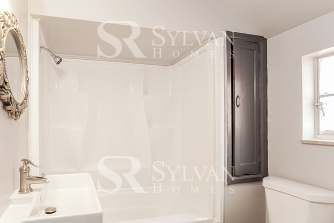 Building Photo - Charming brick 3-bedroom, 1-bath home features a deck and patio!