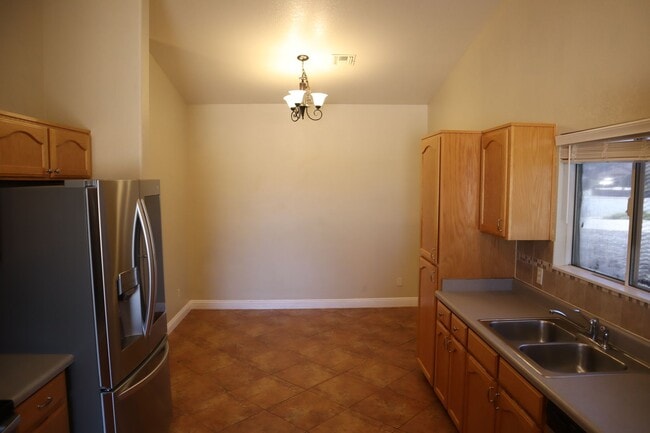 Building Photo - Home With A Pool and Much More!