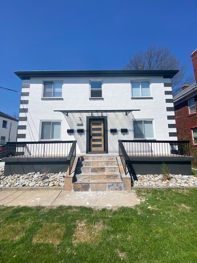 Outdoor mailboxes protected by modern awning - 3041 Cleinview Ave