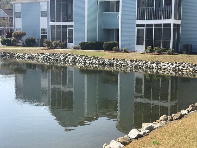 Building Photo - FIRST FLOOR, SURFSIDE BEACH THREE-BEDROOM CONDO, AVAILABLE SOON!!