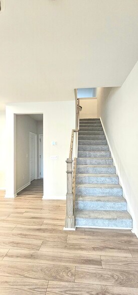 Stairs to upper level - 904 Kinsey Aly