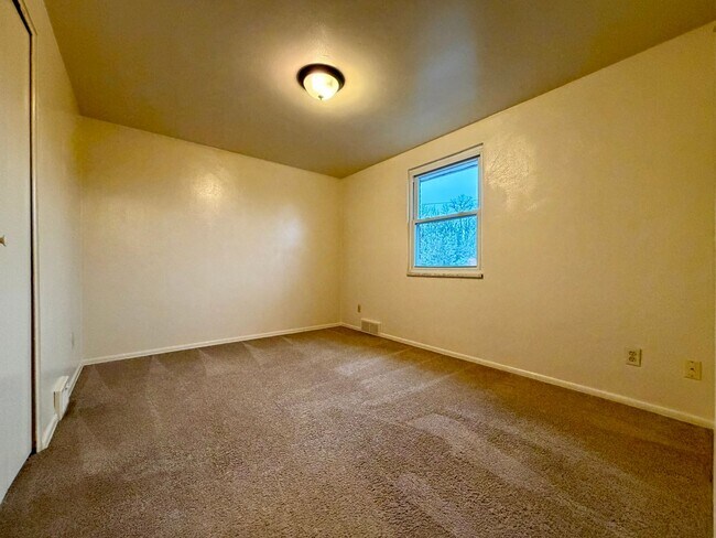 Building Photo - Stunning 2 BR Townhouse with Attached Garage! Central A/C & MORE!! CALL TODAY TO SCHEDULE A TOUR!