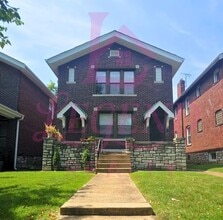 Building Photo - 4942 Tholozan Ave