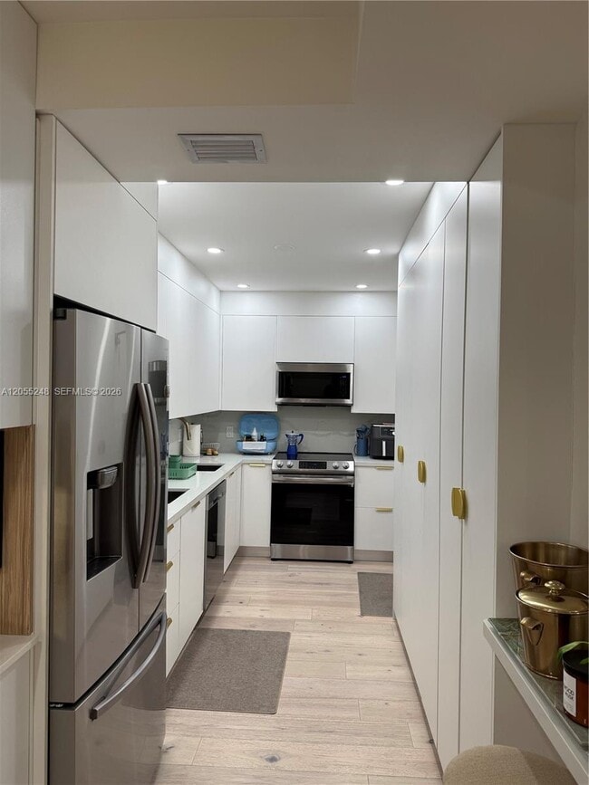Building Photo - 10185 Collins Ave