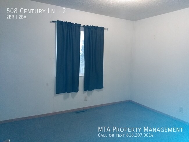 Building Photo - Two Bedroom 1.5 bath unit for rent