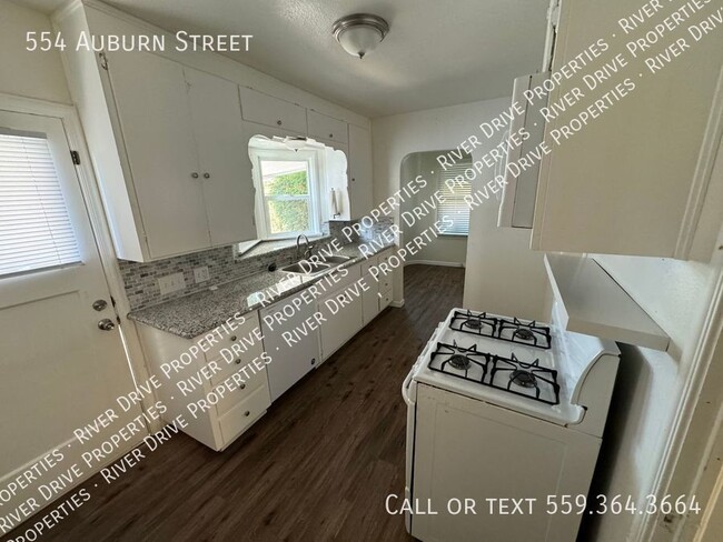 Building Photo - PRICE DROP- Spacious Vintage Beauty in Tulare