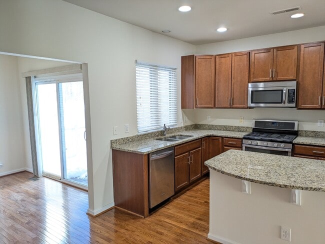 Building Photo - Brambleton Elegance: A Spacious Townhome Oasis