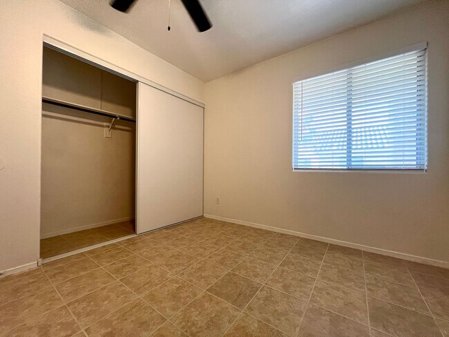 Building Photo - Spacious 3-bedroom, 2-bath condo with acce...