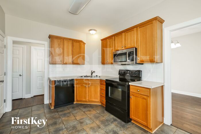Building Photo - 5816 Brakenwood Dr