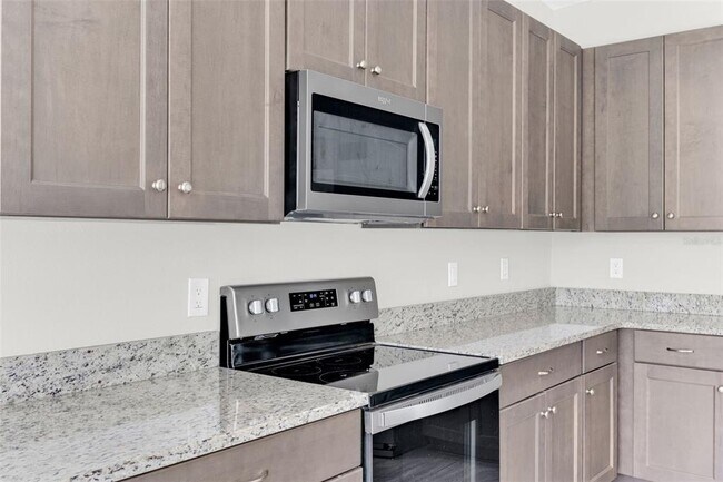 Building Photo - 6321 Tillandsia Pl