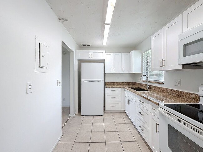 Building Photo - Desirable 55 plus community condo unit with a view of the lake on the 2nd Floor.