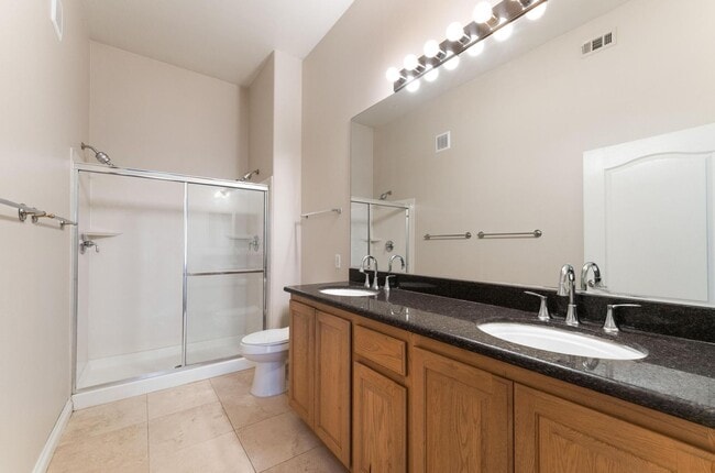 Building Photo - Upgraded condo in gated community