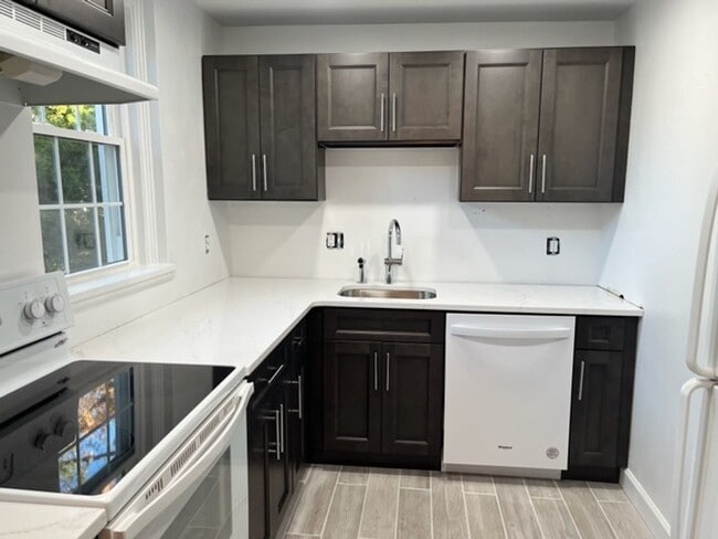Building Photo - This residence showcases a beautifully upd...