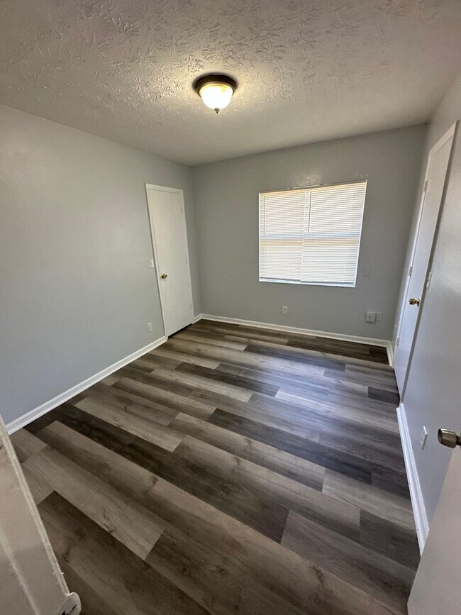 Building Photo - Fully Renovated 3/1.5 -Single Family! Avai...