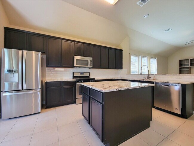 Building Photo - "Charming 3-Bed, 2-Bath Retreat in Humble, TX – Your Perfect Home Awaits on Justin Ridge Ln!"