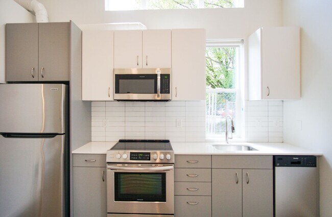 Building Photo - Spacious 1-Bedroom w/Condo-Grade Finishes