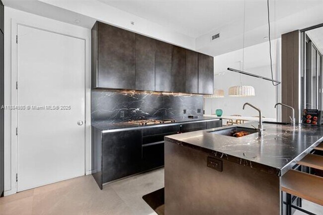 Building Photo - 9705 Collins Ave