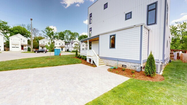Building Photo - Turn-Key Luxury Rental: Brand-New 4BD + Office w/ Private Sunset Rooftop
