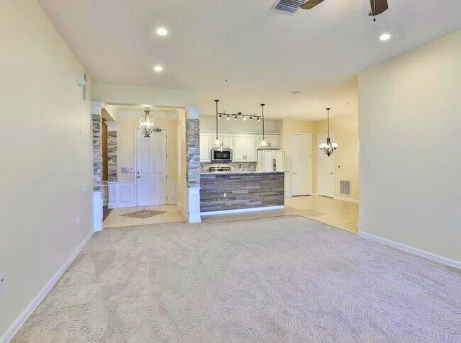 Building Photo - Unfurnished Serene Lakeside Living: Spacio...