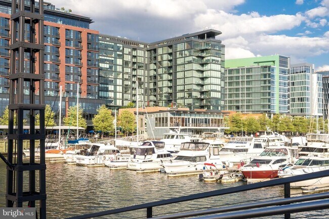 Building Photo - Designer-Furnished Waterfront Living at VIO Condominiums!