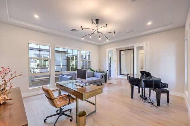 Building Photo - Exquisite 6-bed/ 6-bath residence nestled within the prestigious, guard-gated community of Revere...