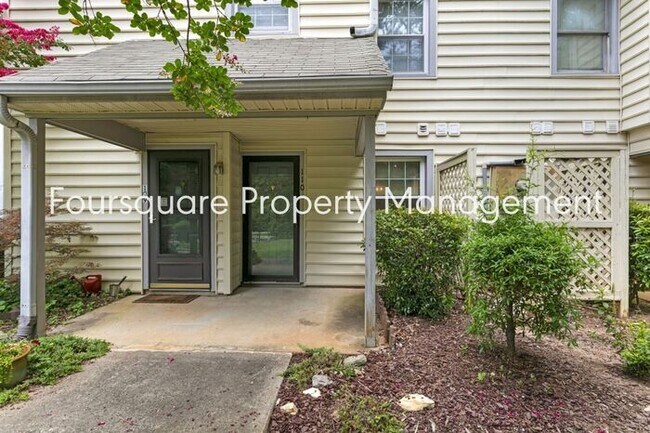 Building Photo - Charming 1st-Floor End-Unit Condo with Gas Log Fireplace, Private Back Porch & Community Pool – T...