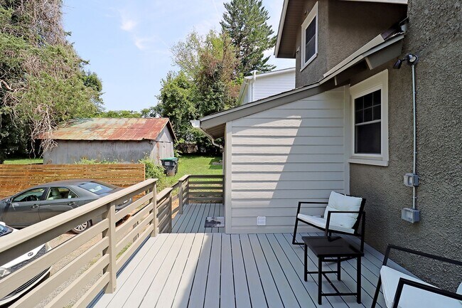 Building Photo - Furnished, Light-Filled Apartment With Utilities Included