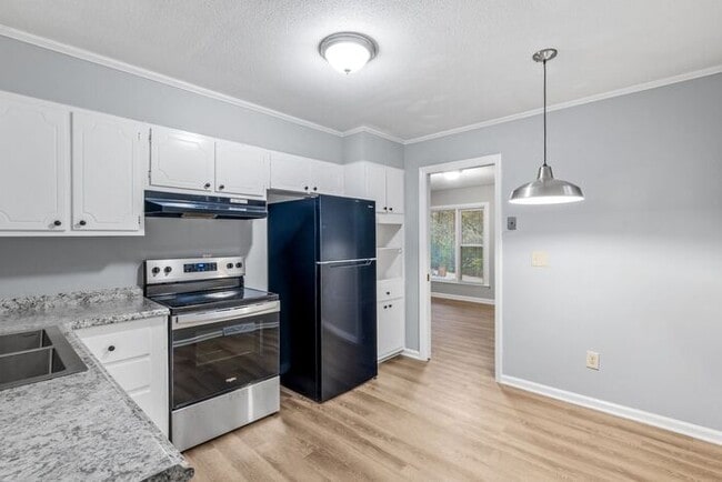 Building Photo - McLeansville - Minutes from Elon & Greensboro! Few Acres, Brick Duplex, Just Painted, New Carpet,...