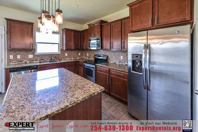 Building Photo - Enchanting 4-bedroom, 2-bathroom home nest...