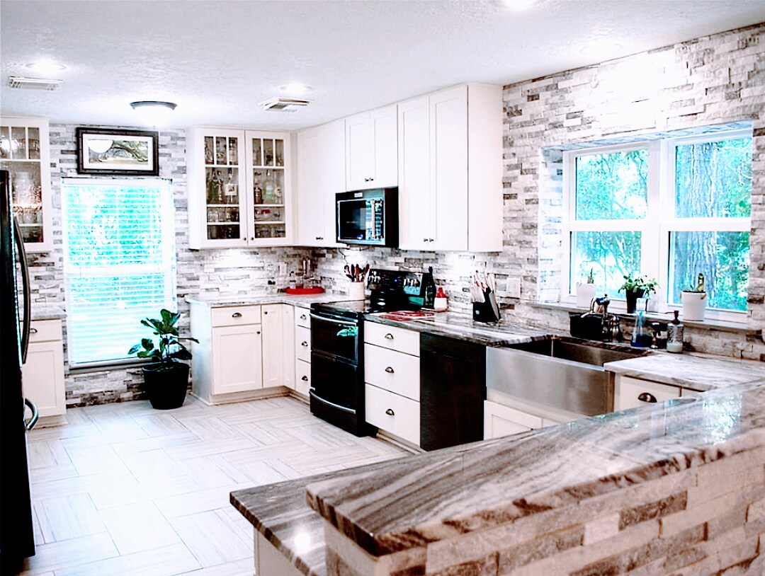 Huge kitchen with new, custom ceiling-height cabinets that offer ample storage and soft-close hinges - 2 Arnica Ct