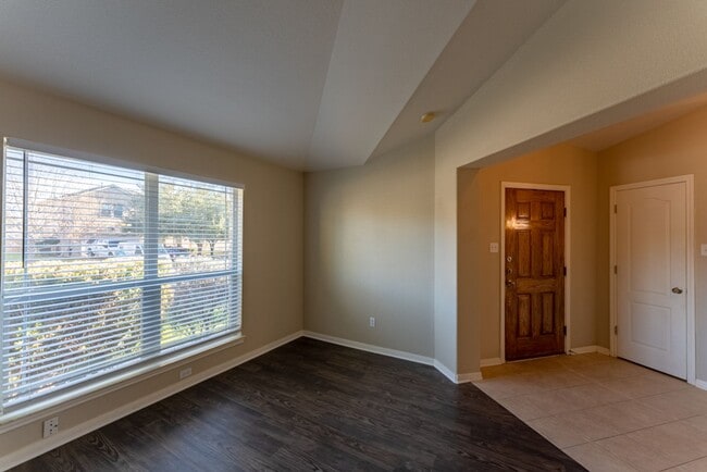 Building Photo - Charming Brick Home with Open Floorplan, Vaulted Ceilings, and Luxurious Amenities—Perfect for An...