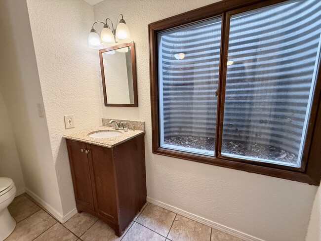 Building Photo - Beautifully Updated 5 Bedroom Rockrimmon Ranch Home Backing to Open Space