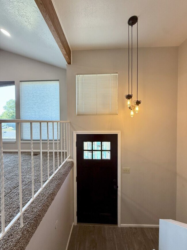 Building Photo - Spacious Comfort Meets Practical Living in...