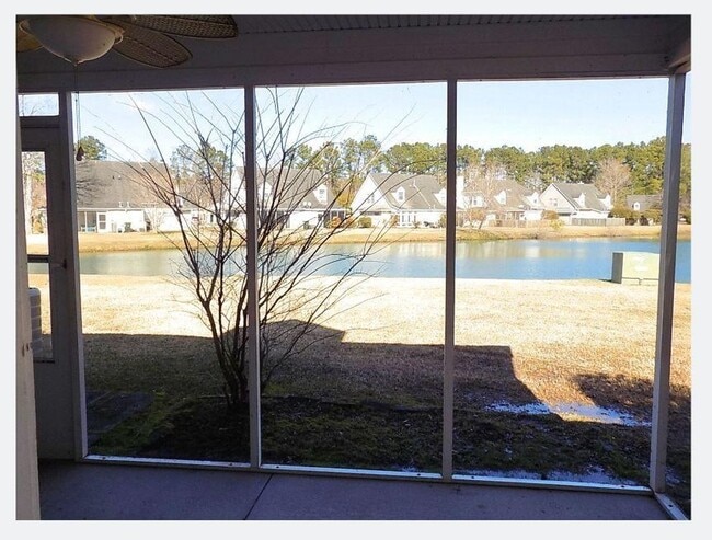 Building Photo - Spacious Condo with Expansive Pond Views