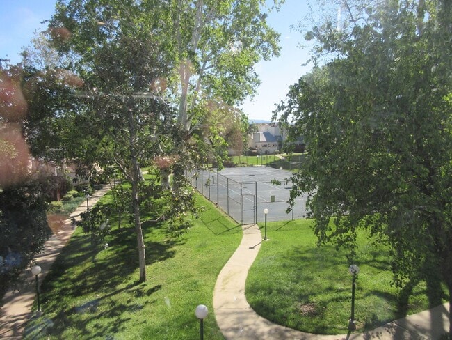 Building Photo - Duggan Property Management, Inc presents  *Reduced*  Canoga Park- 3BD 2.5BA